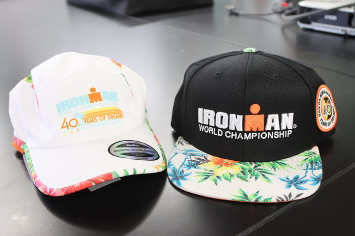 IronMan鐵人世錦賽紀念帽，左邊是跑步運動帽，右邊是潮帽