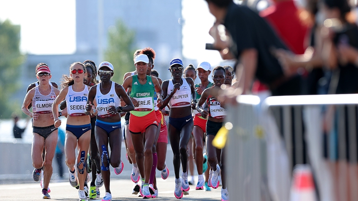 KAWAGOE, JAPAN - AUGUST 07: Molly Seidel of Team United States, Sally Kipyego of Team United States, Roza Dereje of Team Ethiopia and Lonah Chemtai Salpeter of Team Israel compete in the Women's Marathon Final on day fifteen of the Tokyo 2020 Olympic Games at Kasumigaseki Country Club on August 07, 2021 in Kawagoe, Japan. (Photo by Lintao Zhang/Getty Images)