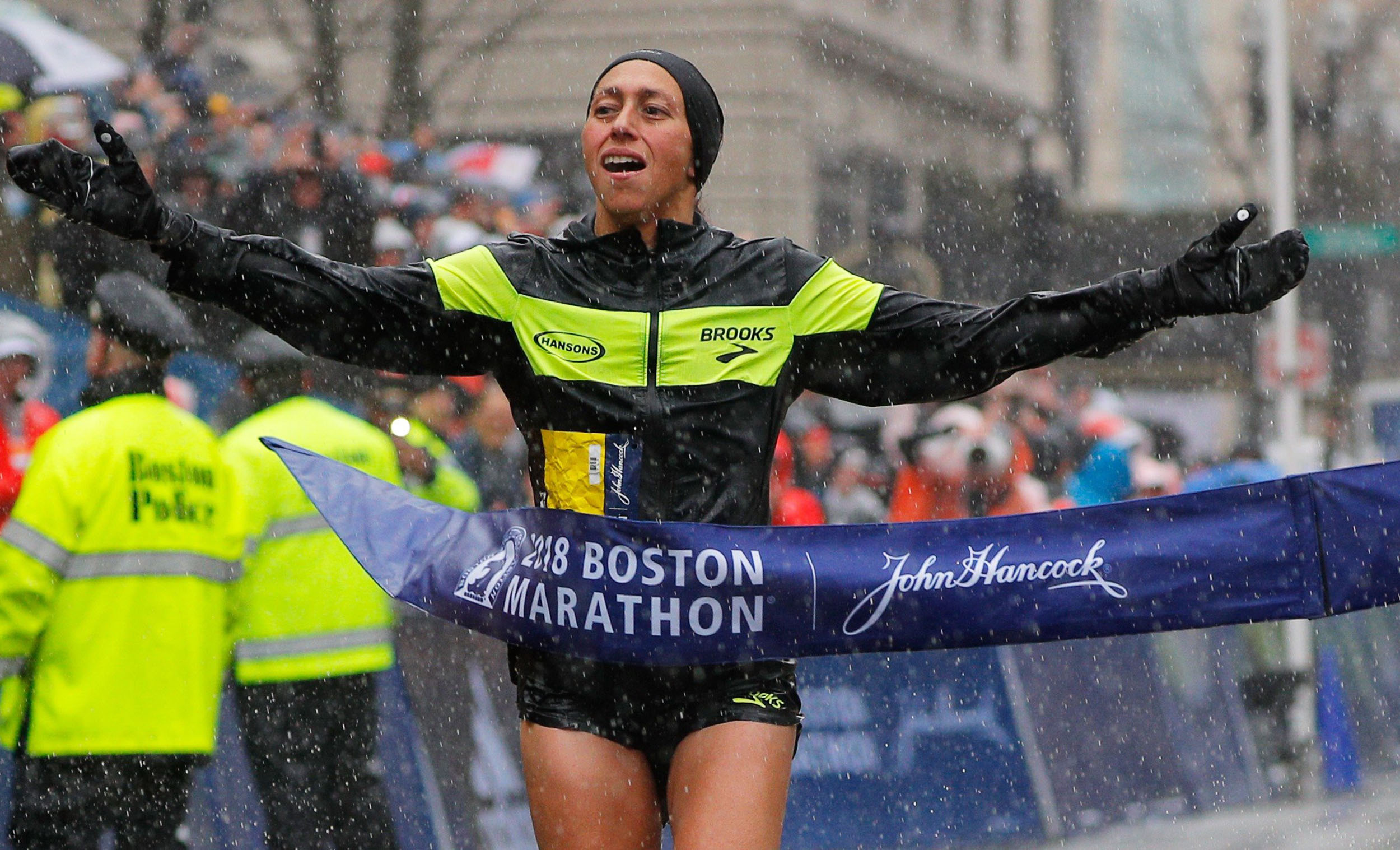 Desiree Linden of the U.S. crosses the finish line to win the women's division of the 122nd Boston Marathon in Boston, Massachusetts, U.S., April 16, 2018. REUTERS/Brian Snyder